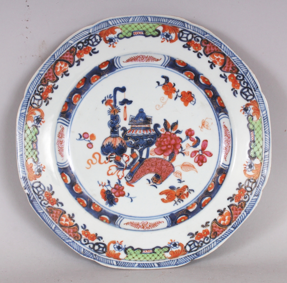 AN 18TH CENTURY CHINESE OCTAGONAL PORCELAIN PLATE, painted in underglaze-blue and puce, iron-red and