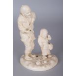 A FINE QUALITY JAPANESE MEIJI PERIOD IVORY OKIMONO OF A STANDING MAN IN THE COMPANY OF A CRYING BOY,