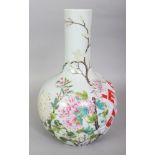 A CHINESE FAMILLE ROSE PORCELAIN BOTTLE VASE, decorated with butterflies hovering above flowers