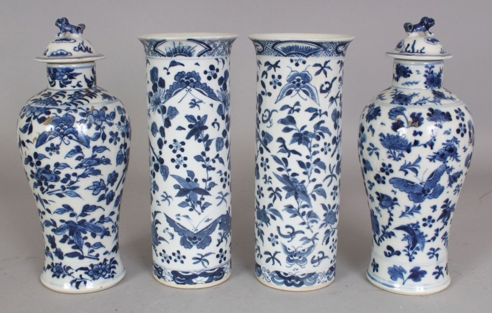 A GARNITURE OF FOUR 19TH CENTURY CHINESE BLUE & WHITE PORCELAIN VASES, two with covers, each painted - Bild 2 aus 8