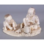 A GOOD QUALITY SIGNED JAPANESE MEIJI PERIOD IVORY OKIMONO OF A SEATED MAN, in the company of his