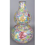 A CHINESE CANTON ENAMEL MILLEFLEUR DOUBLE GOURD VASE, 13.1in high.
