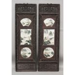 A PAIR OF CHINESE REPUBLIC STYLE WOOD FRAMED PORCELAIN HANGING SCREENS, each inset with three