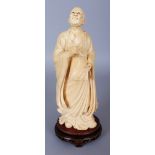 A GOOD LARGE LATE 19TH/EARLY 20TH CENTURY CHINESE IVORY CARVING OF A STANDING SCHOLAR, together with