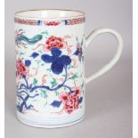 A CHINESE YONGZHENG PERIOD FAMILLE ROSE PORCELAIN TANKARD, circa 1730, the sides painted with a pair