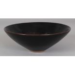 A CHINESE SONG STYLE JIAN WARE PAPERCUT CERAMIC LEAF BOWL, the base unglazed, 6in diameter & 2.1in