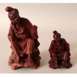 TWO EARLY 20TH CENTURY CHINESE CARVED WOOD FIGURE OF SEATED FISHERMEN, 6.5in & 3.7in high. (2)