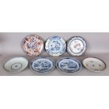 A GROUP OF SEVEN VARIOUSLY DECORATED 18TH CENTURY CHINESE PORCELAIN PLATES, the largest 9.2in