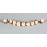 A SUBERB SET OF 18ct GOLD SEED PEARL AND ENAMEL BRACELET AND EAR CLIPS, with enamel swans.