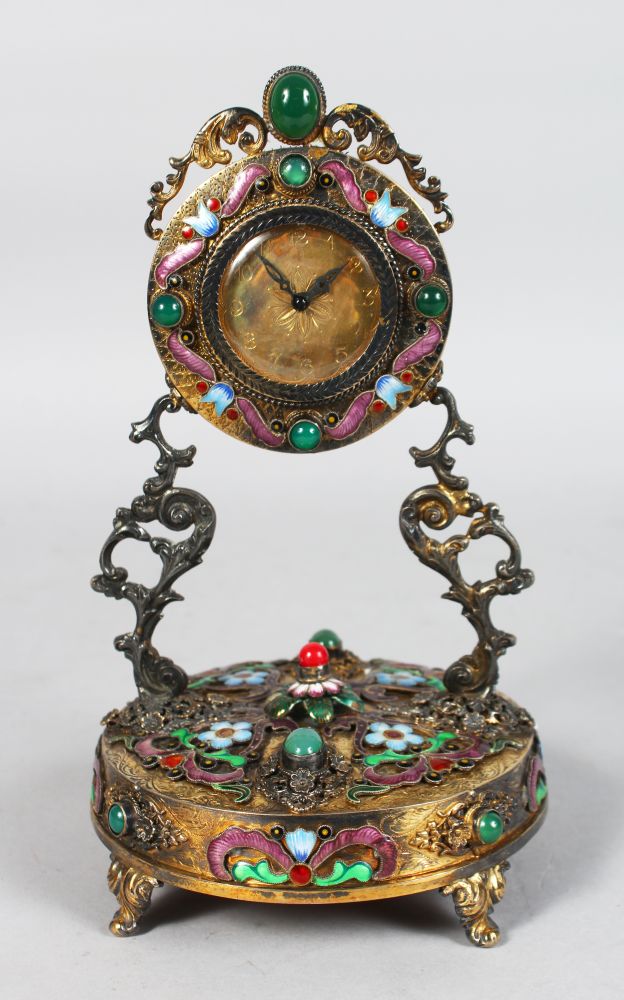 A SUPERB FRENCH SILVER GILT TABLE CLOCK, the case inset with cabouchon stones and enamel flowers,