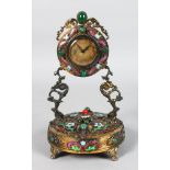 A SUPERB FRENCH SILVER GILT TABLE CLOCK, the case inset with cabouchon stones and enamel flowers,