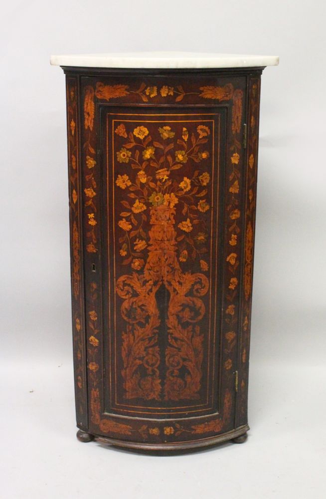 A 19TH CENTURY DUTCH MAHOGANY AND MARQUETRY BOWFRONT STANDING CORNER CUPBOARD, with grey marble