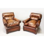 A GOOD PAIR OF BROWN LEATHER CLUB ARMCHAIRS, with button upholstered backs, deep loose seat