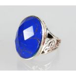 A large silver and blue moonstone ring.