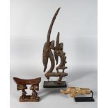 TWO AFRICAN CARVED WOOD TRIBAL ITEMS, an antelope group and a neck rest, together with an early
