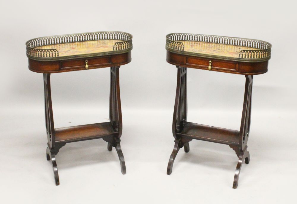 A PAIR OF 20TH CENTURY MAHOGANY SIDE TABLES, with brass galleried oval marble tops, each with a