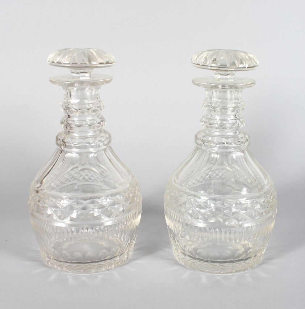 A GOOD PAIR OF MALLET CUT DECANTERS AND STOPPERS, 9.25in high