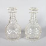 A GOOD PAIR OF MALLET CUT DECANTERS AND STOPPERS, 9.25in high