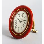 A CARTIER OF PARIS OVAL EASEL CLOCK, 3.5in x 2.25in. in a red Cartier bag No: 7507/15122