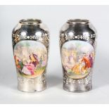 A GOOD PAIR OF FRENCH SILVER OVERLAY VASES, painted with reverse panels of scenes with gallant and