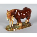 A ROYAL DOULTON PORCELAIN HORSE AND FOAL HN2533 7in long