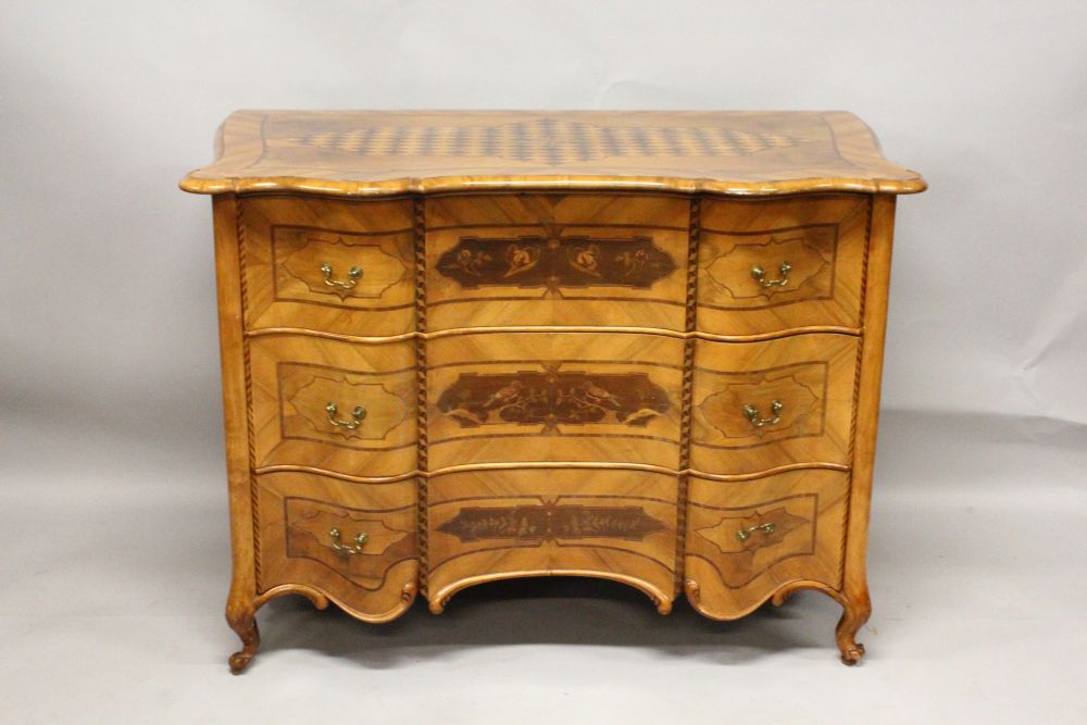 AN 18TH CENTURY FRENCH WALNUT AND MARQUETRY COMMODE, with a parquetry inlaid top over three long - Image 2 of 3