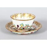 AN 18TH CENTURY MEISSEN PORCELAIN TEA BOWL AND SAUCER, the outer side of the bowl and saucer with