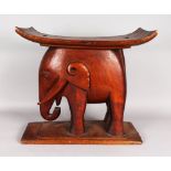 A LARGE AFRICAN ASHANTI/ASANTE CARVED WOODEN ELEPHANT TRIBAL STOOL. 18.5ins height, 22ins length.