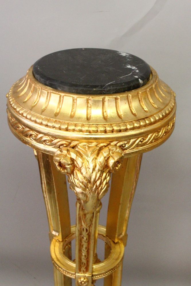 A PAIR OF GILT WOOD TORCHERES, with marble tops and rams head decoration, 3ft 10in high - Image 2 of 2