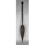 A CEREMONIAL PADDLE, NIGER DELTA, NIGERIA, 19TH/20TH CENTURY Carved wood The leaf-shaped blade