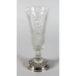 A FRENCH SLENDER CUT GLASS VASE with silver base. 8.5ins high.
