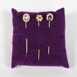 THREE GOLD TIE PINS, set with seed pearls
