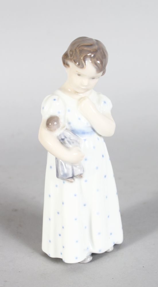 A ROYAL COPENHAGEN FIGURE OF A YOUNG GIRL WITH A DOLL No: 3539 5.5in high