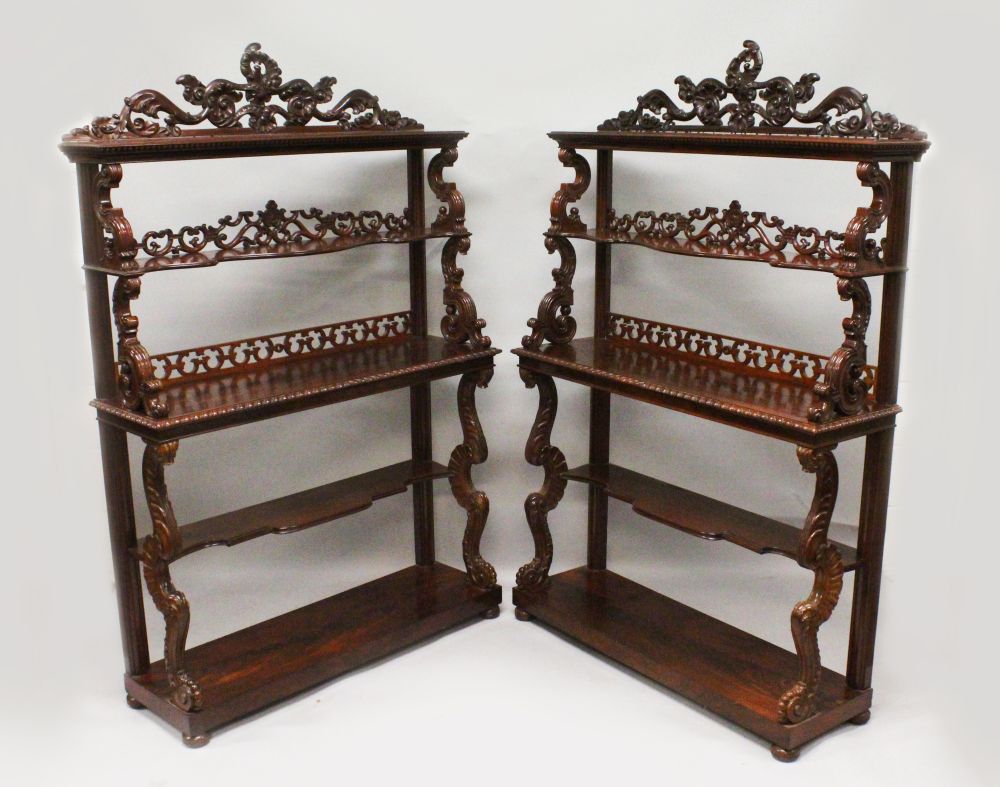 A SUPERB PAIR OF LATE REGENCY MAHOGANY STANDING OPEN BOOKCASES, with open backs three tiers with