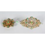 A SUBERB PAIR OF GOLD FOLDING CUFFS, set with emeralds and diamonds, total weight 80 grams