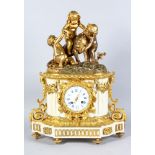 A SUPERB 19TH CENTURY LOUIS XVIth GILT ORMOLU AND WHITE MARBLE MANTLE CLOCK, surmounted by three
