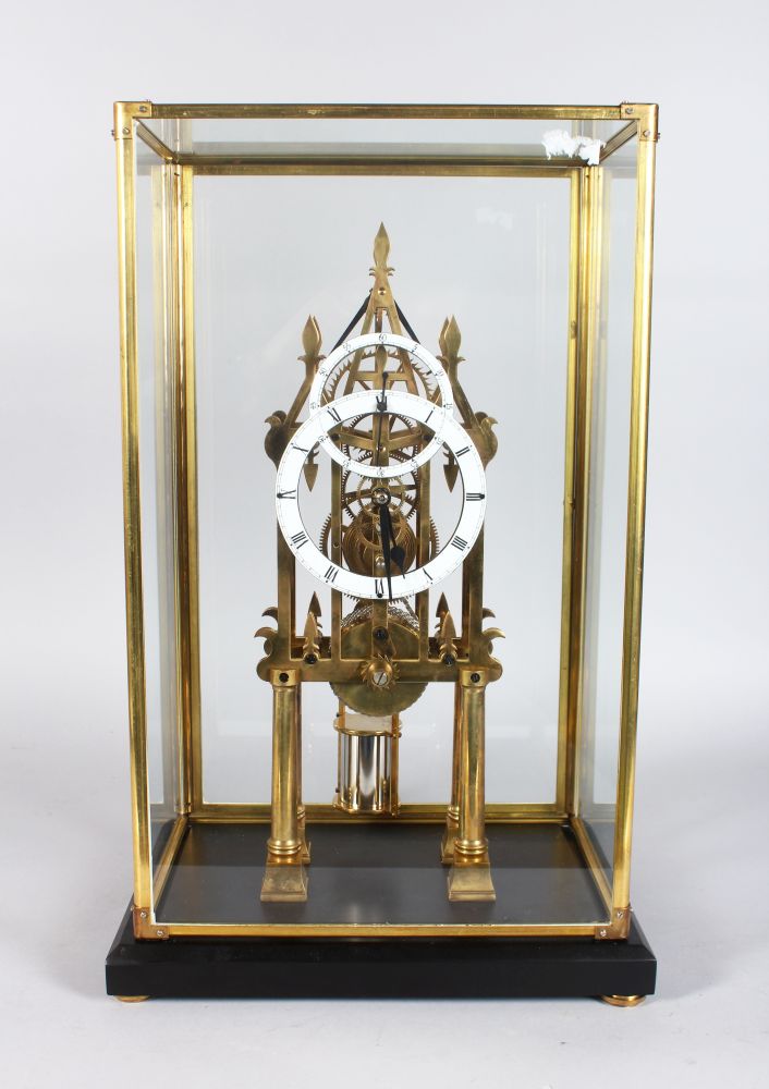 A GOOD CATHEDRAL STYLE SKELETON CLOCK, 20TH CENTURY, in a glass case, 1ft 9in high