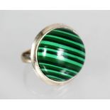 A large silver and malachite ring.