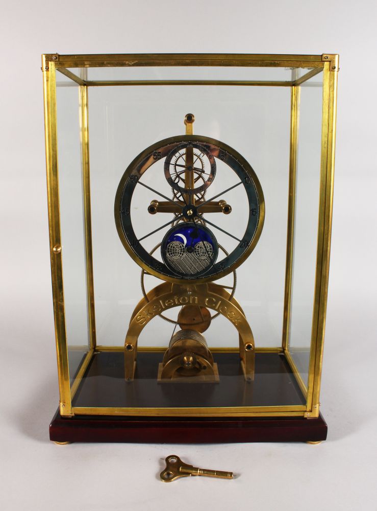 A LARGE SKELETON CLOCK, with silvered dial, subsidiary seconds dial and blue enamel moon phase