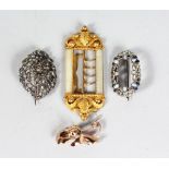 A GILT BUCKLE WITH MOTHER OF PEARL DECORATION, and three various brooches