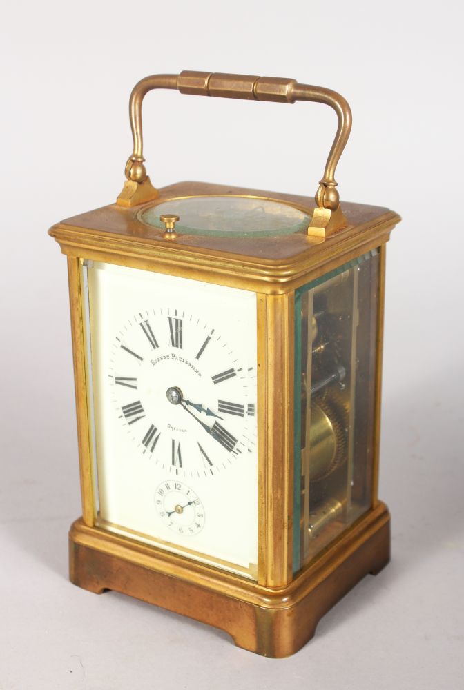 A GOOD FRENCH BRASS CARRIAGE CLOCK, striking on a gong, with enamel dial, signed Robert Pleissner,