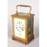 A GOOD FRENCH BRASS CARRIAGE CLOCK, striking on a gong, with enamel dial, signed Robert Pleissner,