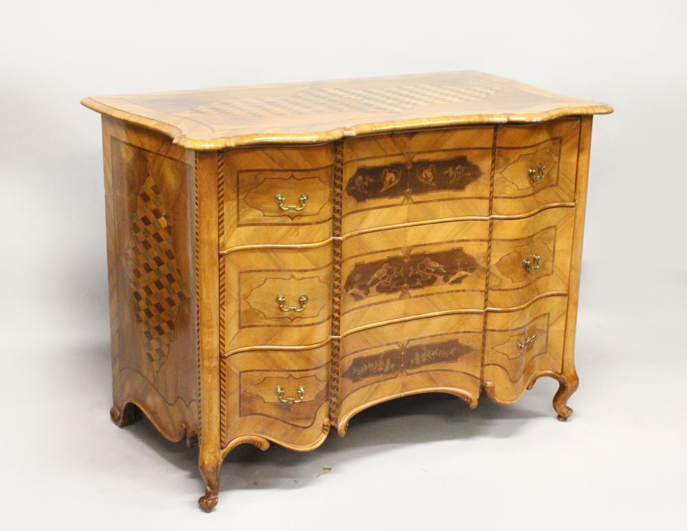 AN 18TH CENTURY FRENCH WALNUT AND MARQUETRY COMMODE, with a parquetry inlaid top over three long