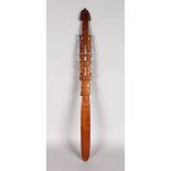 PAPUA NEW GUINEA (20TH CENTURY), A CARVED WOODEN LIME-SPATULA (BETEL SPOON) 28.5ins in length.
