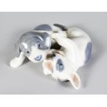 A ROYAL COPENHAGEN GROUP OF PLAYFUL PUPPIES No: 453 3.5in