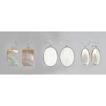 Three pairs of silver and mother-of-pearl earrings.