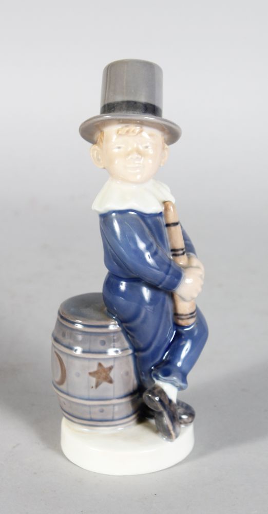 A ROYAL COPENHAGEN FIGURE OF A BOY WEARING A TOP HAT No: 4524 7in high