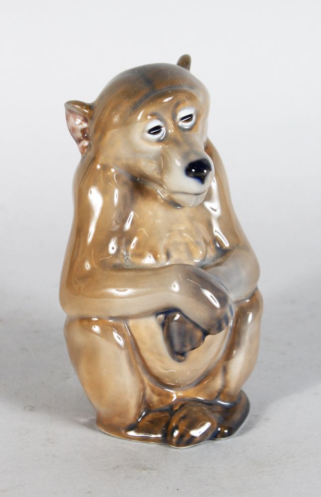 A ROYAL COPENHAGEN MODEL OF A SEATED MONKEY No: 1444 5in high