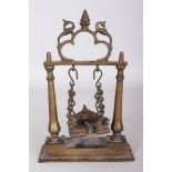 A Brass Portable Saivite Shrine, Deccan, Southern India, 19th century, in the form of a swing,