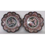 A GOOD PAIR OF JAPANESE MEIJI PERIOD LOBED CLOISONNE DISHES, each decorated with a dragon panel to